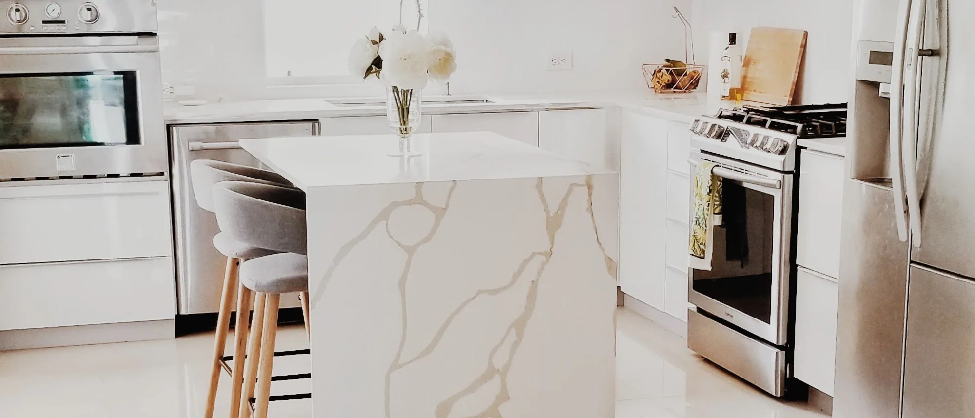Timeless Panache kitchen in warm neutrals with large windows