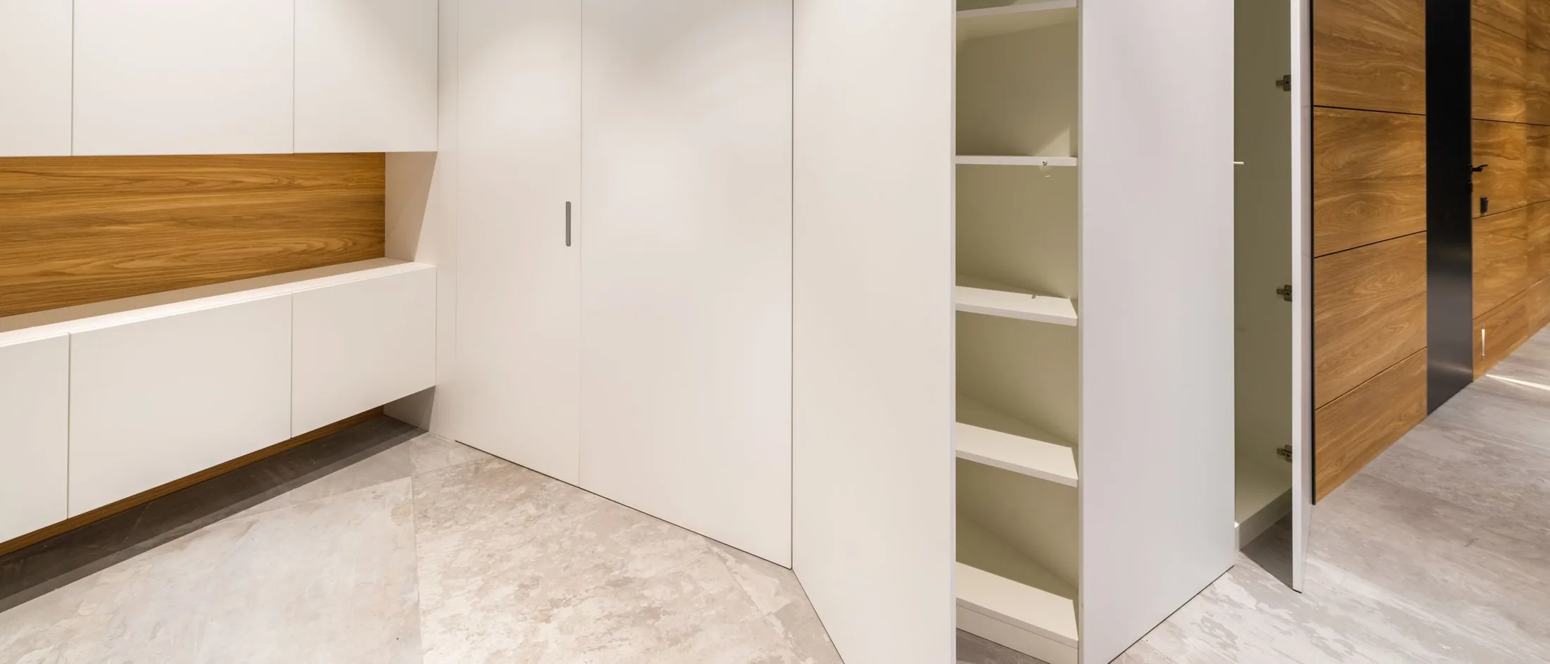 Warm timber walk-in wardrobe interior